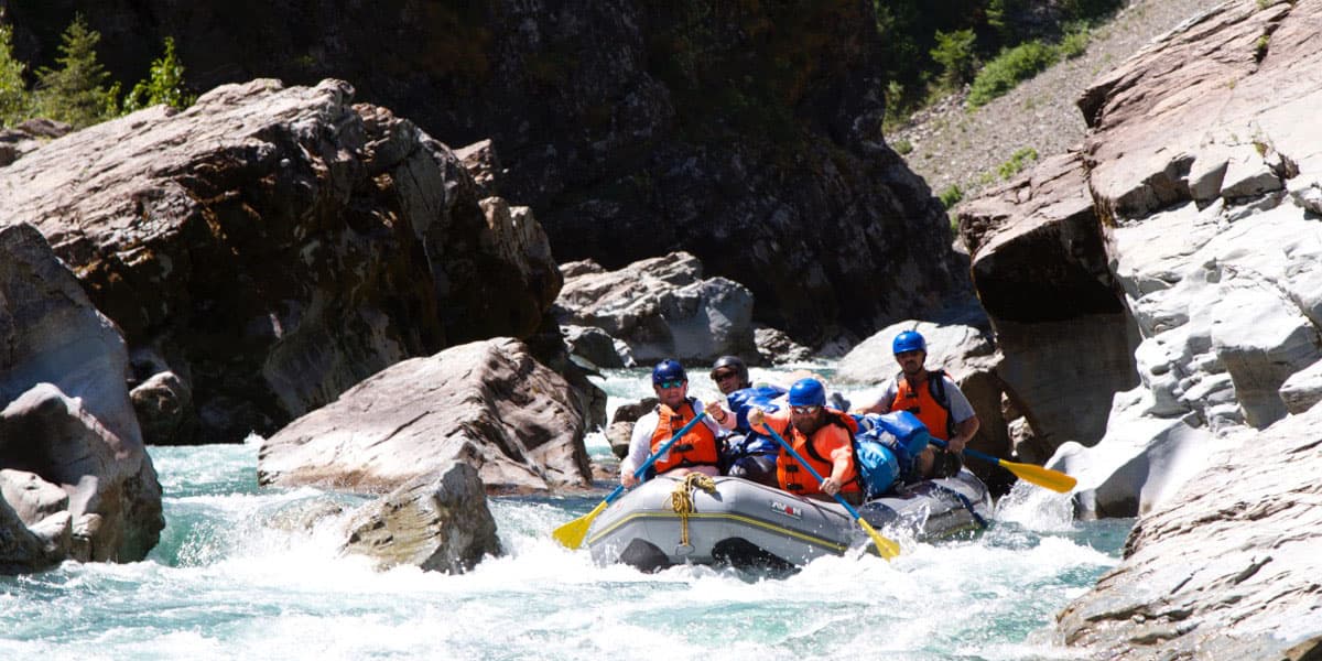 raft coming through whitewater rapids